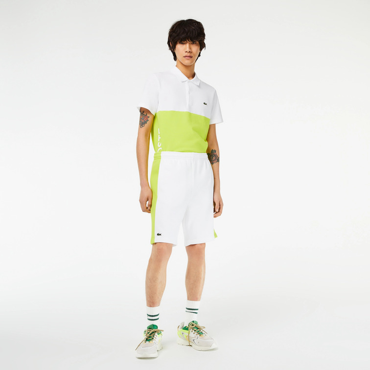 PANTALÓN CORTO EN FELPA DE ALGODÓN COLORBLOCK HOMBRE LACOSTE