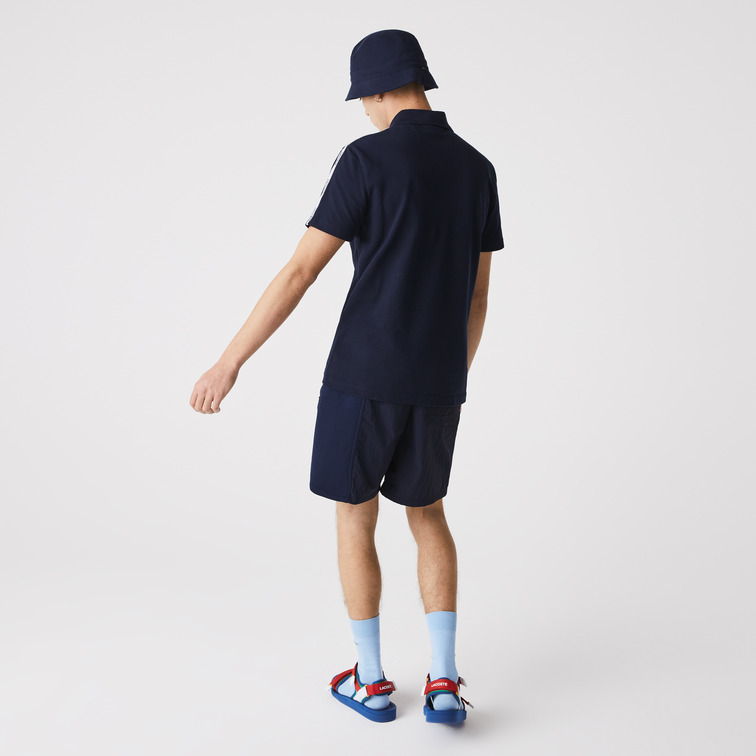 POLO CON FRANJAS ESTAMPADAS HOMBRE LACOSTE
