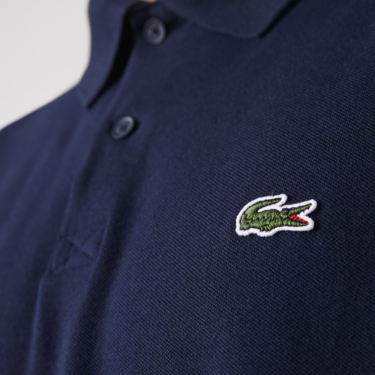 POLO CON FRANJAS ESTAMPADAS HOMBRE LACOSTE