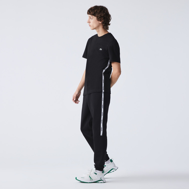 CAMISETA CON FRANJAS CON INSCRIPCIÓN HOMBRE LACOSTE