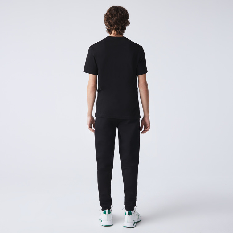 CAMISETA CON FRANJAS CON INSCRIPCIÓN HOMBRE LACOSTE