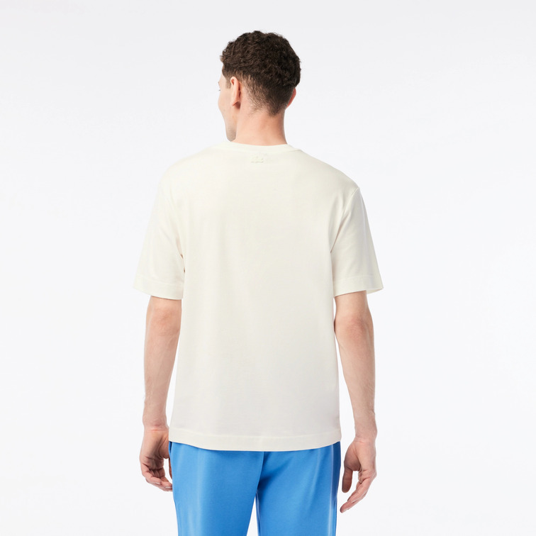 CAMISETA ESTAMPADA EN ALGODÓN ECOLÓGICO HOMBRE LACOSTE X NETFLIX
