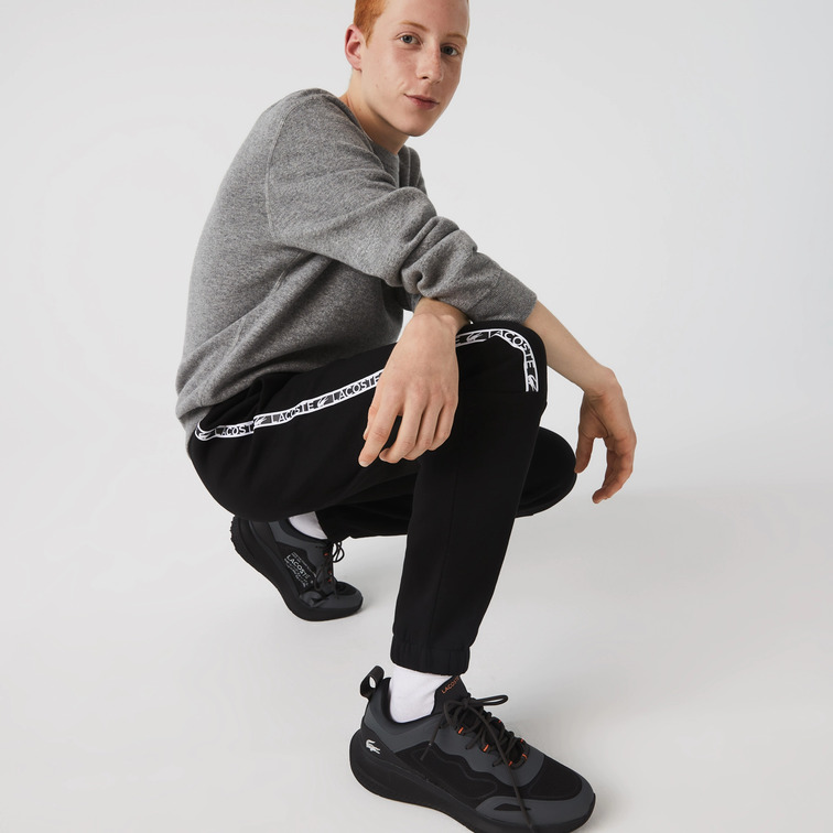 PANTALÓN DE CHÁNDAL CON FRANJAS ESTAMPADAS HOMBRE LACOSTE