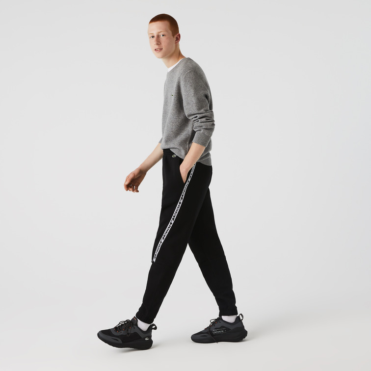 PANTALÓN DE CHÁNDAL CON FRANJAS ESTAMPADAS HOMBRE LACOSTE