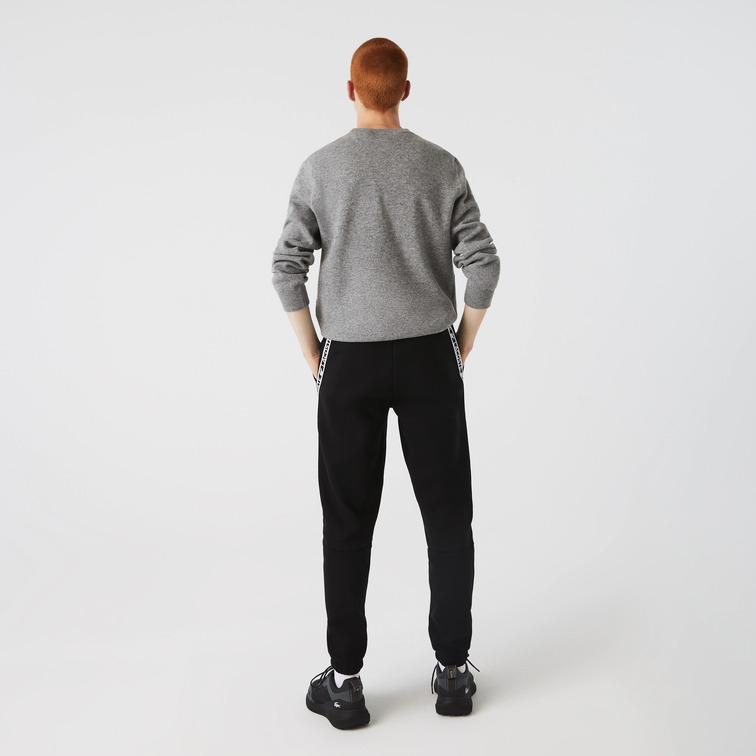PANTALÓN DE CHÁNDAL CON FRANJAS ESTAMPADAS HOMBRE LACOSTE