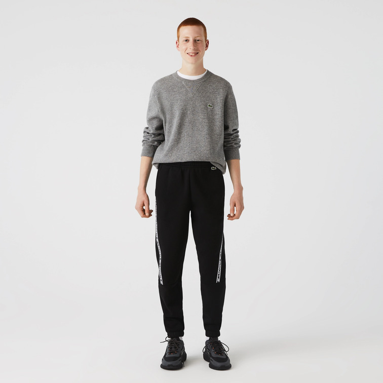 PANTALÓN DE CHÁNDAL CON FRANJAS ESTAMPADAS HOMBRE LACOSTE