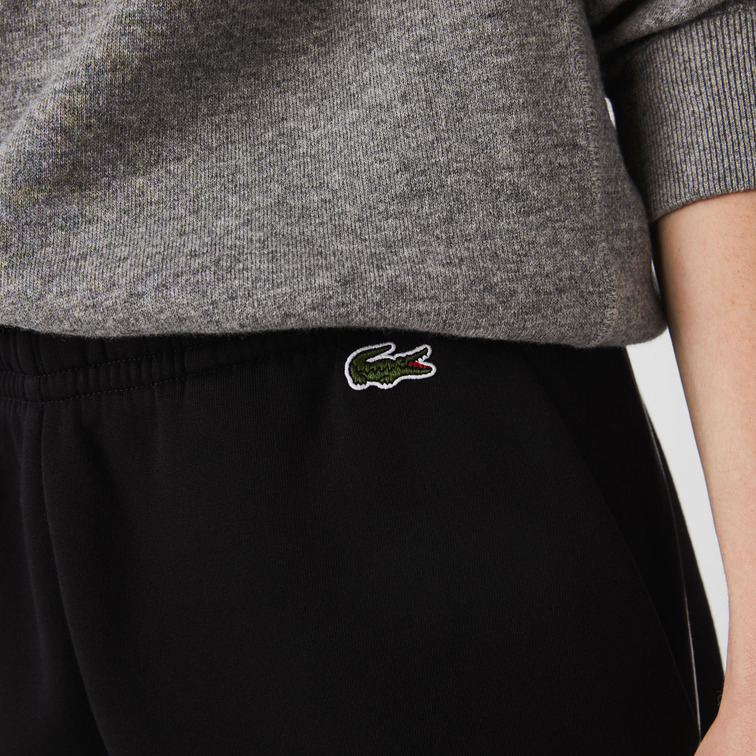 PANTALÓN DE CHÁNDAL CON FRANJAS ESTAMPADAS HOMBRE LACOSTE