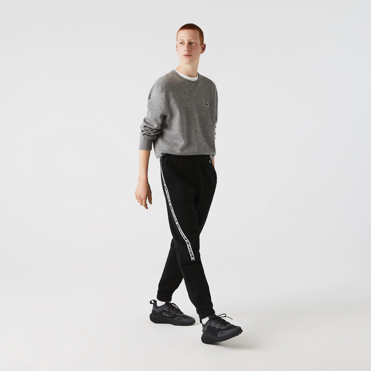 PANTALÓN DE CHÁNDAL CON FRANJAS ESTAMPADAS HOMBRE LACOSTE