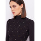 JERSEY DE CUELLO ALTO CON TACHUELAS MUJER GAUDI