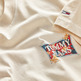 CAMISETA LOGO FLORAL HOMBRE TOMMY JEANS