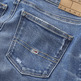 VAQUERO CEÑIDO DE TALLE MEDIO MUJER TOMMY JEANS NORA