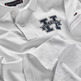 POLO NIÑO TOMMY HILFIGER DE CORTE REGULAR CON INICIAL