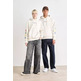 SUDADERA CON CAPUCHA HOMBRE TOMMY JEANS ESCUDO EN MANGAS FIT HOLGADO